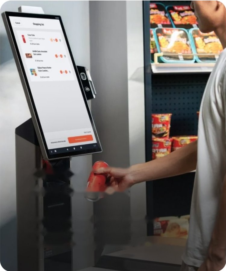 Customer using the RONPOS self checkout kiosk